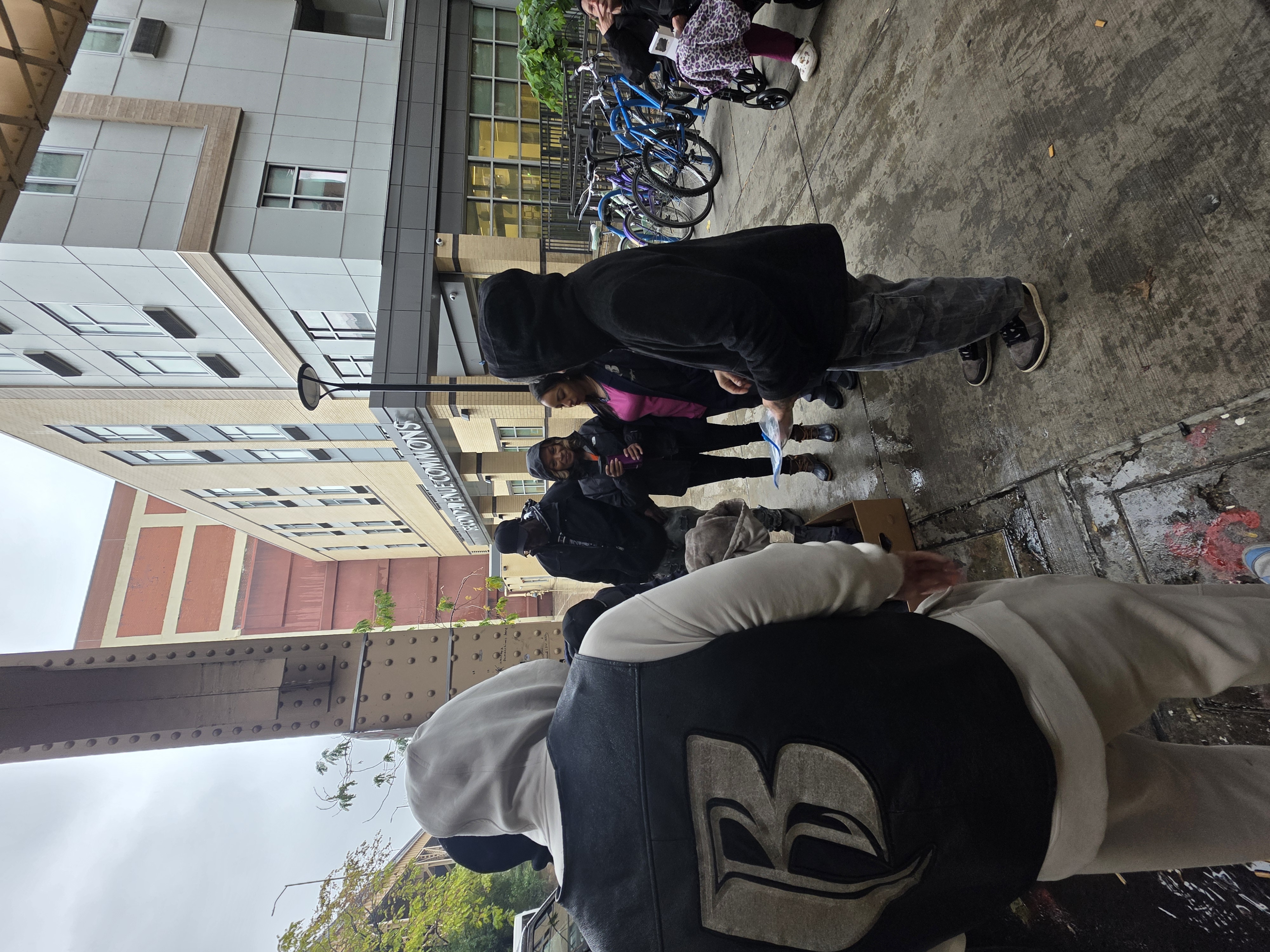 Ruff Ryders volunteers engaging with community at Second Avenue outreach