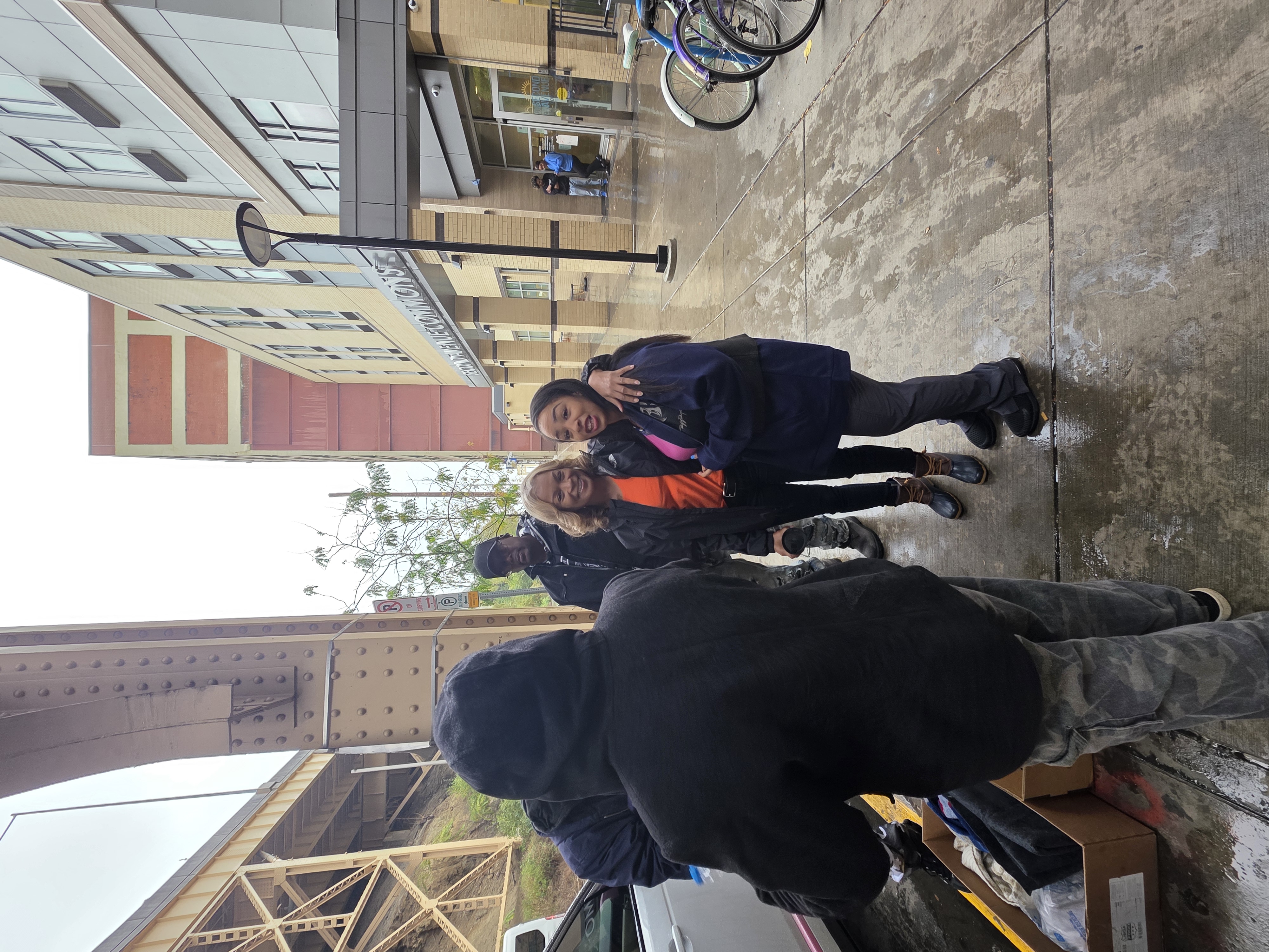 Ruff Ryders team members connecting with community residents during street outreach